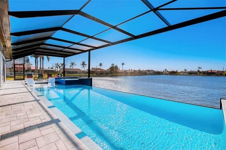 Grayscale to Color Waterfront Pool Design SWFL